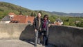 Couple on Vacation, atop the round defense tower Southeast corner, fortified church of St. Michael Royalty Free Stock Photo