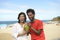 Couple on vacation drinking coconut water Royalty Free Stock Photo