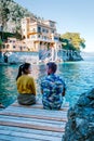 Couple on vacation ligurian coast Italy, Portofino famous village bay, Italy colorful village Ligurian coast