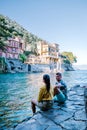 Couple on vacation ligurian coast Italy, Portofino famous village bay, Italy colorful village Ligurian coast