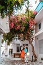 Couple on vacation Mykonos Greece, Little Venice Mykonos Greece, sunset at ocean fron at Mykonos town