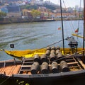 Couple of vintage boats with wine barrels Porto Portugal