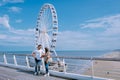 Couple visit The Ferris Wheel The Pier at Scheveningen, The Hague, The Netherlands Royalty Free Stock Photo