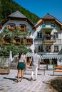 Couple visit Hallstatt village on Hallstatter lake in Austrian Alps Austria Royalty Free Stock Photo