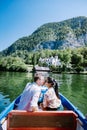 Couple visit Hallstatt village on Hallstatter lake in Austrian Alps Austria Royalty Free Stock Photo