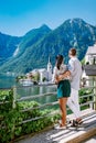 Couple visit Hallstatt village on Hallstatter lake in Austrian Alps Austria Royalty Free Stock Photo