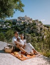 Couple visit the old town of Gordes Provence,Blooming purple lavender fields at Senanque monastery, Provence, southern Royalty Free Stock Photo