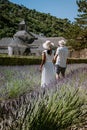 Couple visit the old town of Gordes Provence,Blooming purple lavender fields at Senanque monastery, Provence, southern Royalty Free Stock Photo