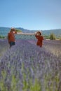 Couple visit the old town of Gordes Provence,Blooming purple lavender fields at Senanque monastery, Provence, southern Royalty Free Stock Photo