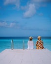 couple visit Playa Porto Marie beach Curacao, white tropical beach with turqouse water ocean Royalty Free Stock Photo