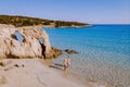 couple visit the Tropical beach of Voulisma beach, Istron, Crete, Greece during vacation