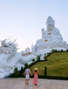 Couple visit Wat Huay Pla Kang Chiang Rai Thailand, Big Budha temple in Chiang Rai Royalty Free Stock Photo