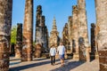 Couple visit Wat Mahathat, Sukhothai old city, Thailand., Sukothai historical park Thailand