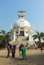 Couple taking selphy in front of dhauli temple