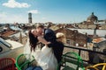 Couple walk in old town lviv,kissing,loving. On the roof Royalty Free Stock Photo