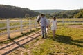 Couple walk at the ranch during summer day Royalty Free Stock Photo