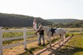 Couple walk at the ranch during summer day Royalty Free Stock Photo