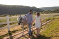 Couple walk at the ranch during summer day Royalty Free Stock Photo