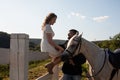 Couple walk at the ranch during summer day Royalty Free Stock Photo