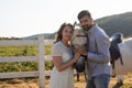 Couple walk at the ranch during summer day Royalty Free Stock Photo