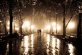 Couple walking at alley in night lights. Royalty Free Stock Photo