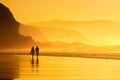 Couple walking in the beach Royalty Free Stock Photo