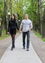 Couple walking down the road Royalty Free Stock Photo