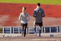 Couple walking downstairs on stadium Royalty Free Stock Photo