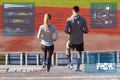 Couple walking downstairs on stadium Royalty Free Stock Photo