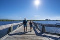 Couple walking in the Florida park by the lake. Royalty Free Stock Photo