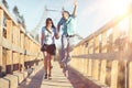 Couple walking on footbridge Royalty Free Stock Photo