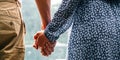 Couple walking. Happy young romantic people holding hands. Love couple man and woman together in summer park. Young Royalty Free Stock Photo