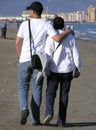 Couple walking - he and his mother