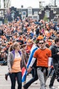 Couple walking at Koninginnedag 2013