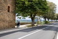 Couple walking in Montalcino. Montalcino is a hill town and comune in the province of Siena, Tuscany