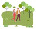 Couple walking in a park. Young man and woman holding hands walking in summer garden, romantic walk