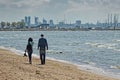 Couple Walking On The Pirita Beach Royalty Free Stock Photo