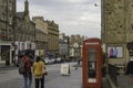 Couple walking in a street of old Edinburgh