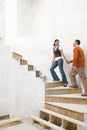 A couple walking up stairs Royalty Free Stock Photo