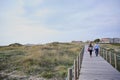 Couple walking on the walkway Royalty Free Stock Photo