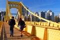 Walking across the Roberto Clemente Bridge Pittsburgh Royalty Free Stock Photo