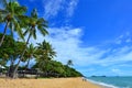 Couple walks on Trinity beach near Cairns Queensland Australia Royalty Free Stock Photo