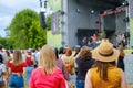 Couple is watching concert at open air music festival