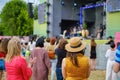 Couple is watching concert at open air music festival