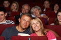 Couple Watching Film In Cinema