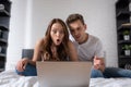 Couple watching movie on laptop in Royalty Free Stock Photo