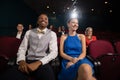 Couple watching movie in theatre Royalty Free Stock Photo