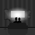 Couple watching movie on TV at night Royalty Free Stock Photo