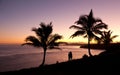 Couple watching sunrise in Kauai