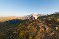 Couple watching sunrise over Mont Blanc summit Royalty Free Stock Photo